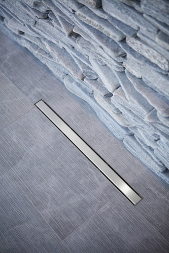 Трап для душа TIM с решеткой под кладку плитки (сух. затвор,горизонт. выпуск) 70*1200 фото в интернет-магазине САНТЕХСИТИ