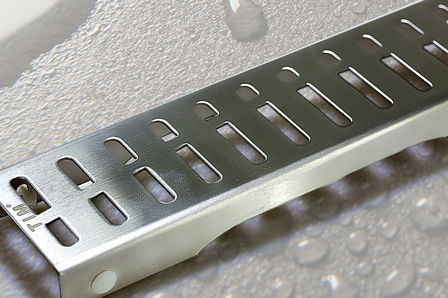 Трап для душа TIM с поворотным механизмом и решеткой (сух. затвор,горизонт. выпуск) 70*600 фото в интернет-магазине САНТЕХСИТИ